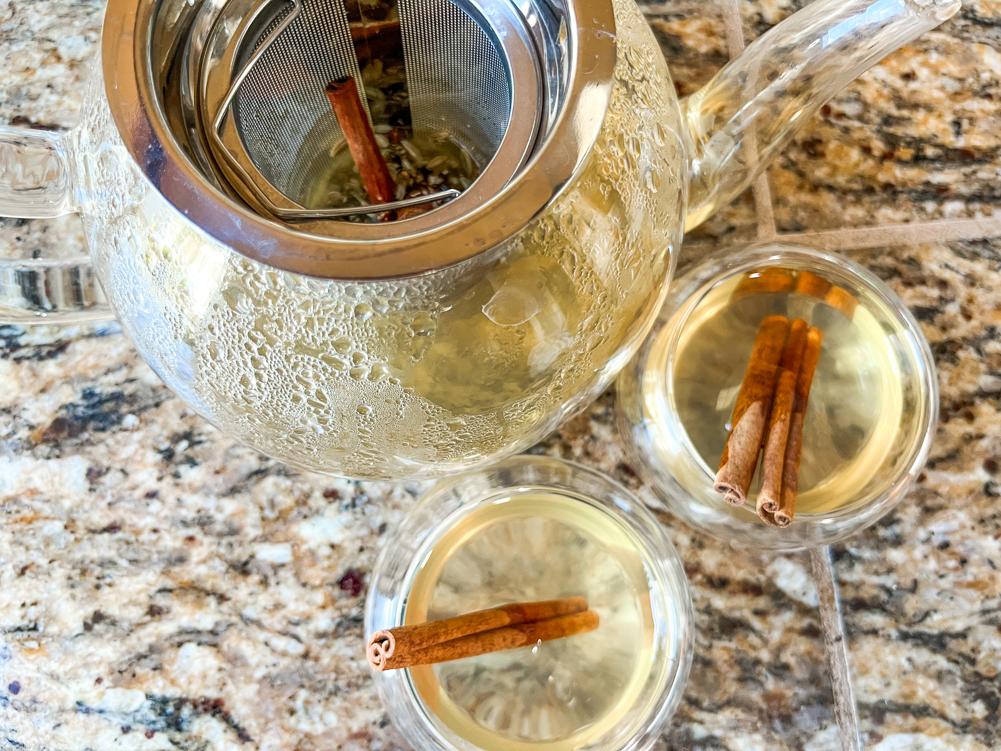 Digestive support tea with two cups and a teapot.