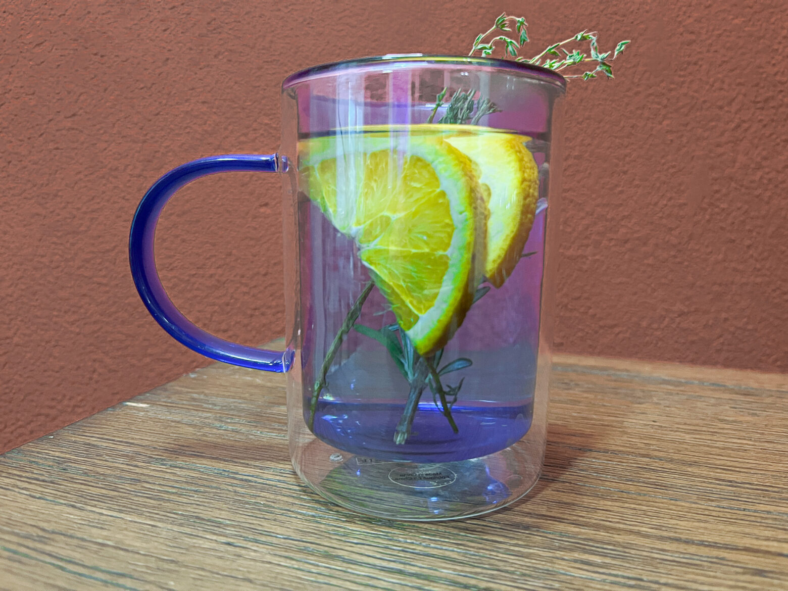 Herbal apple cider vinegar in a cup.