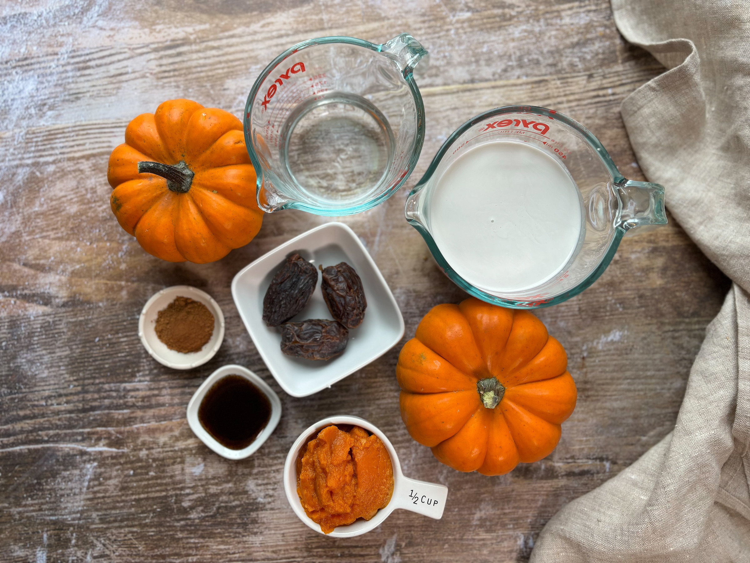 Pumpkin coffee creamer ingredients on a tbale.