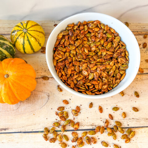 Spiced pumpkin seeds in a bowl.