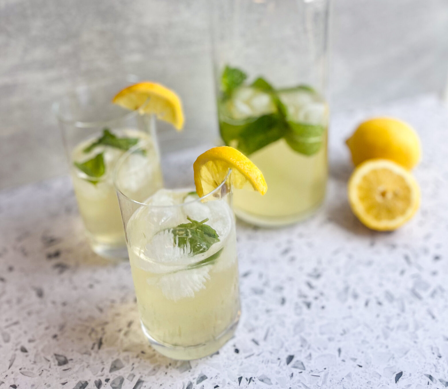 Mango mint lemonade finished in glasses.