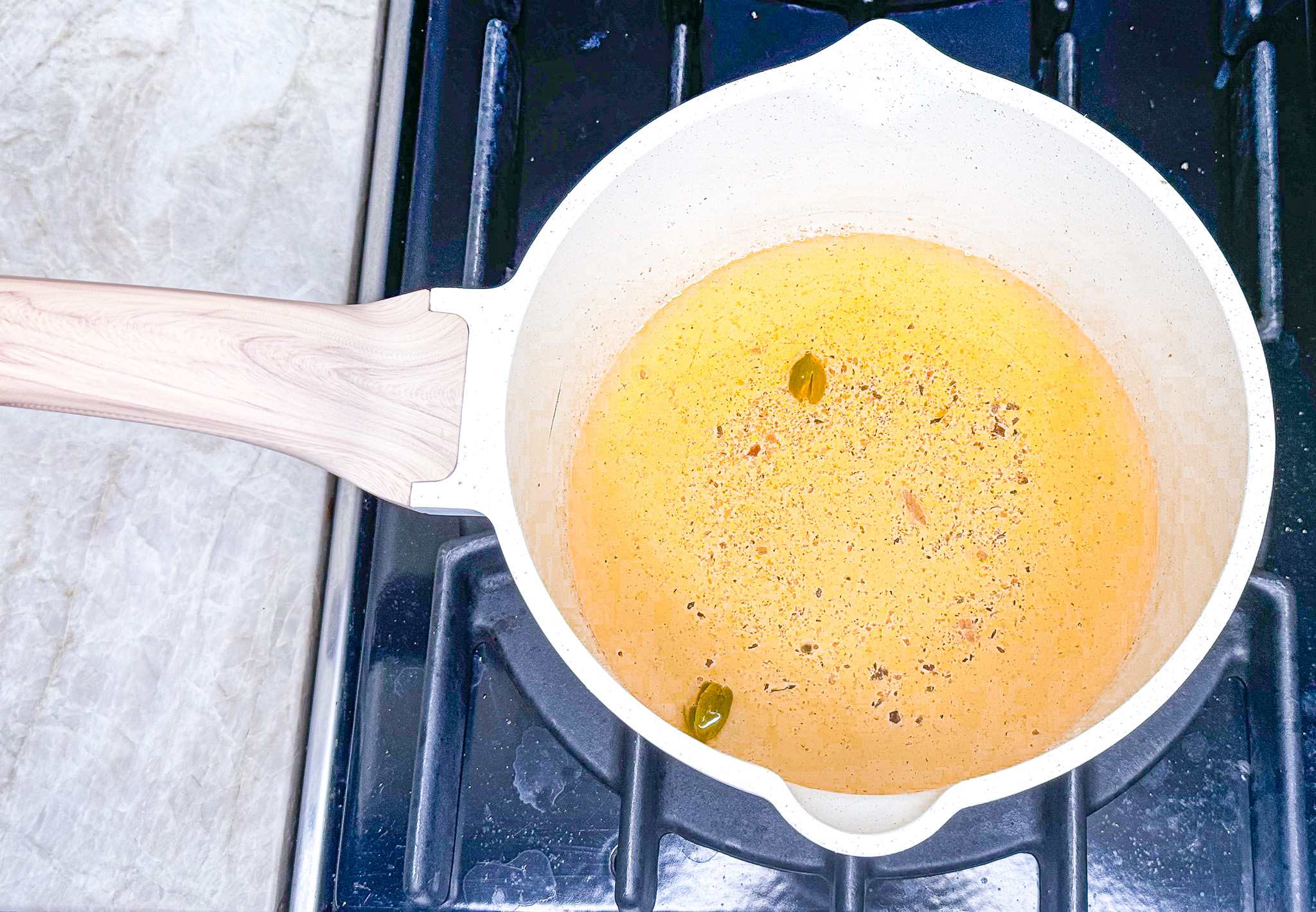 Apple Cider Mocktail prep over the stove.