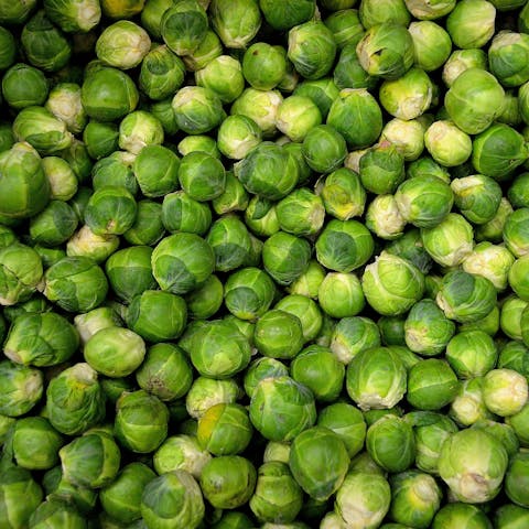A close-up shot of fresh green Brussels sprouts perfect for healthy meals.