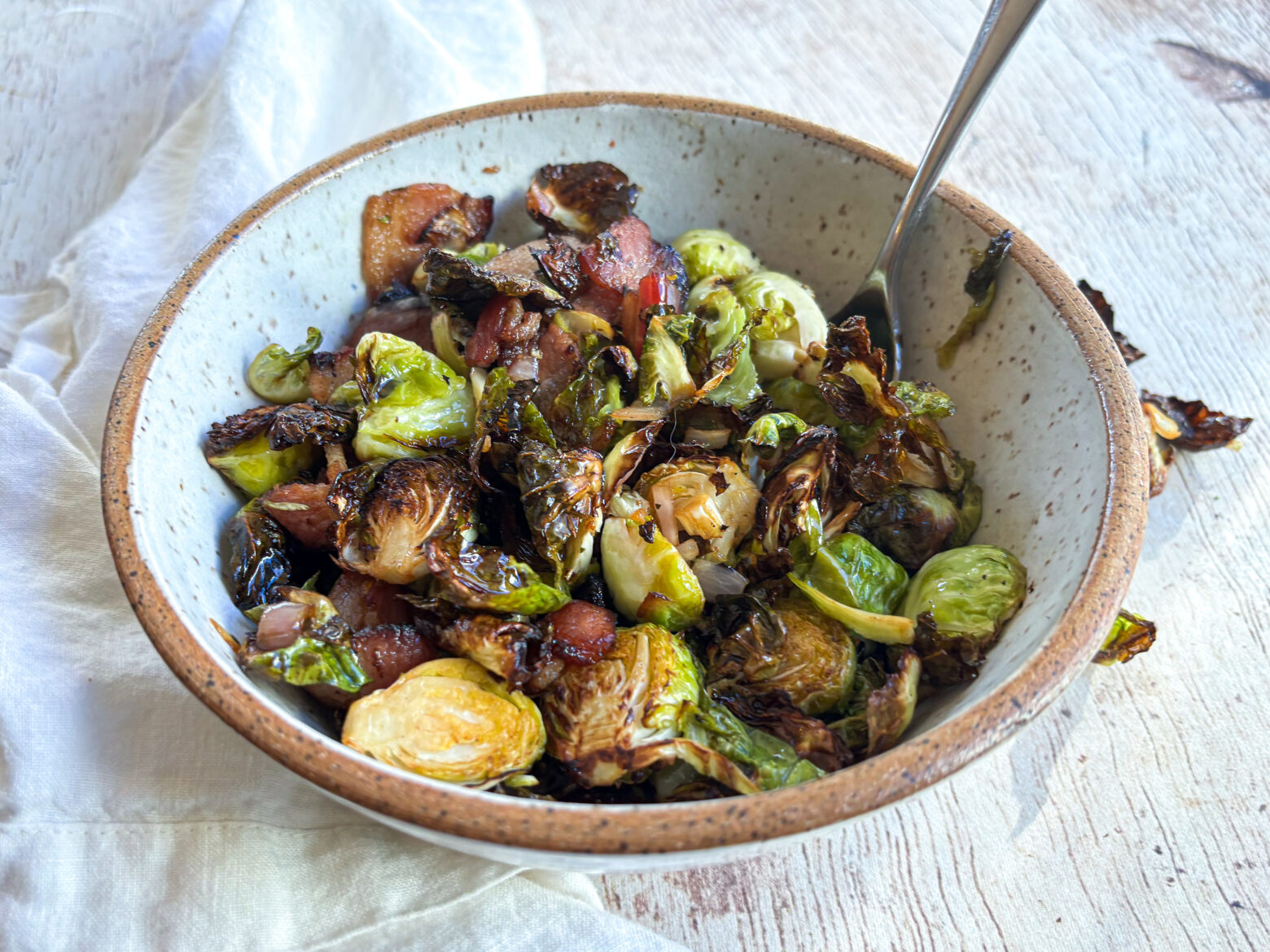 Air fryer balsamic Brussels sprouts in a bowl, finished.