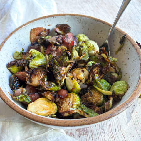 Air fryer balsamic Brussels sprouts in a bowl, finished.