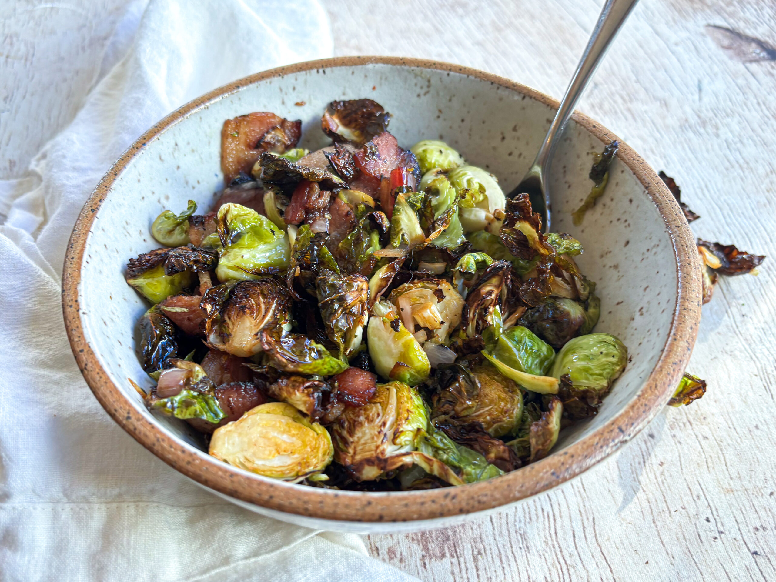 Air fryer balsamic Brussels sprouts in a bowl, finished. 