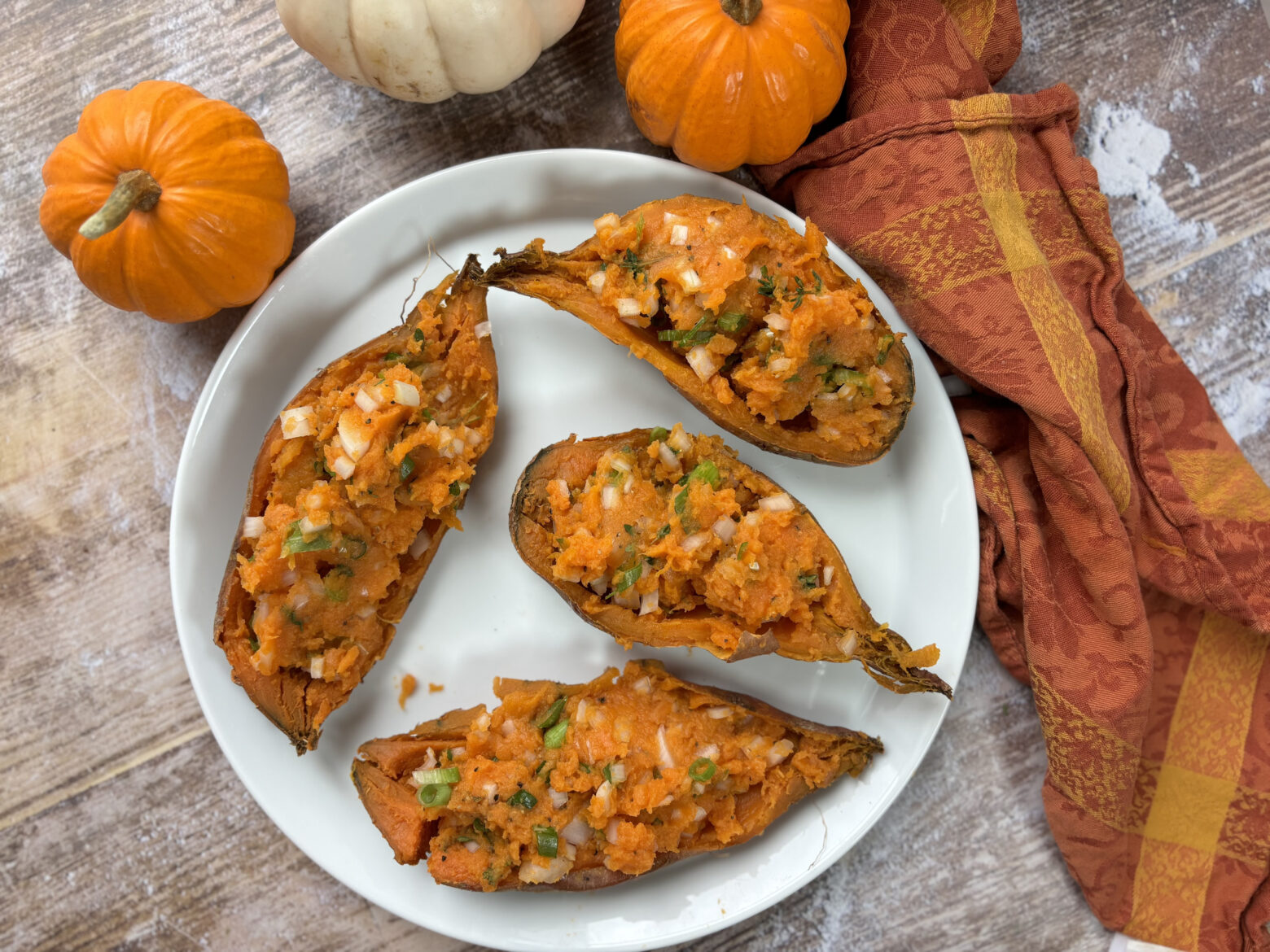 Baked sweet potatoes plated.