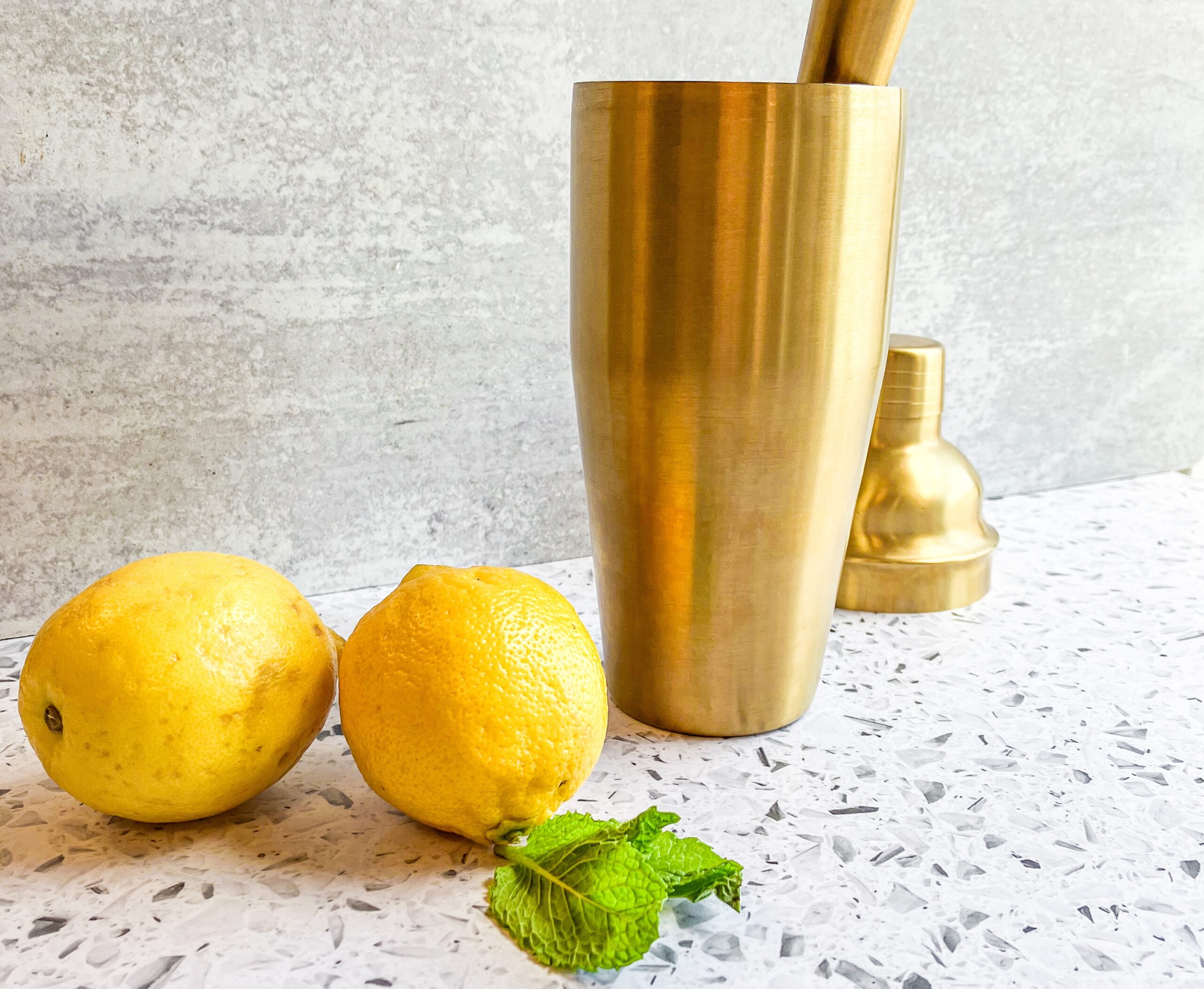 Mango mint lemonade with a cocktail shaker. 