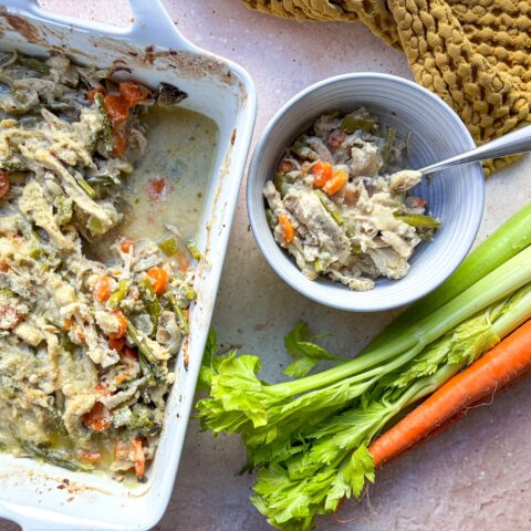 Chicken Pot Pie Casserole finished, with a bowl on the side.