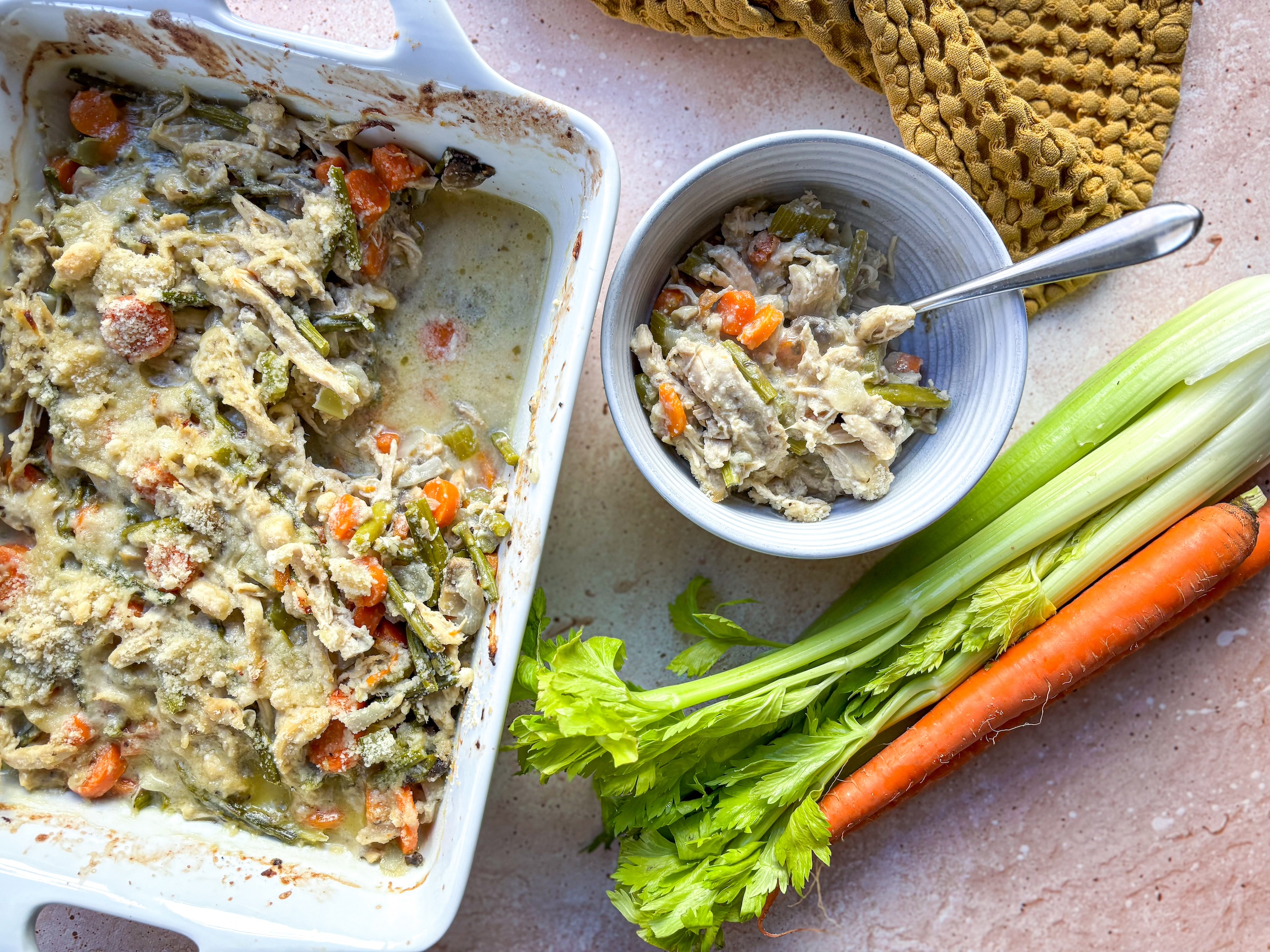 Chicken Pot Pie Casserole finished, with a bowl on the side. 