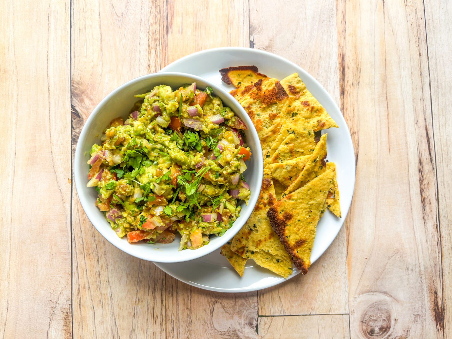 Garden veggie chips and guacamole paired together.