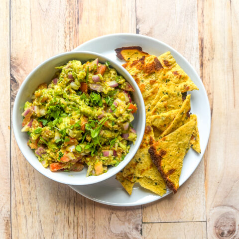 Garden veggie chips and guacamole paired together.