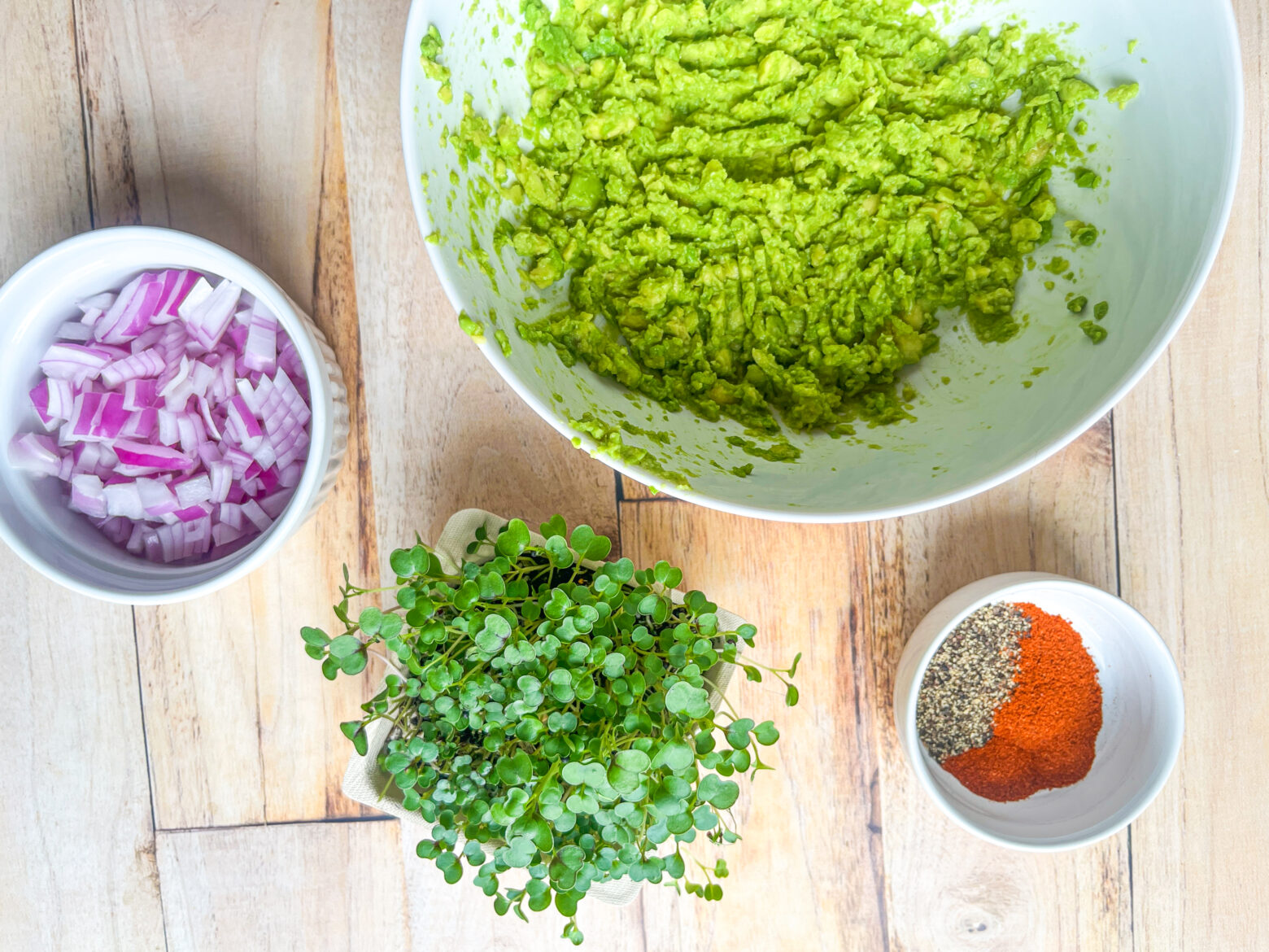 Microgreens guacamole ingredients prepped.