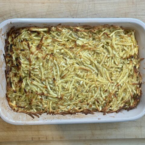 Sweet potato kugel finished in a baking dish.