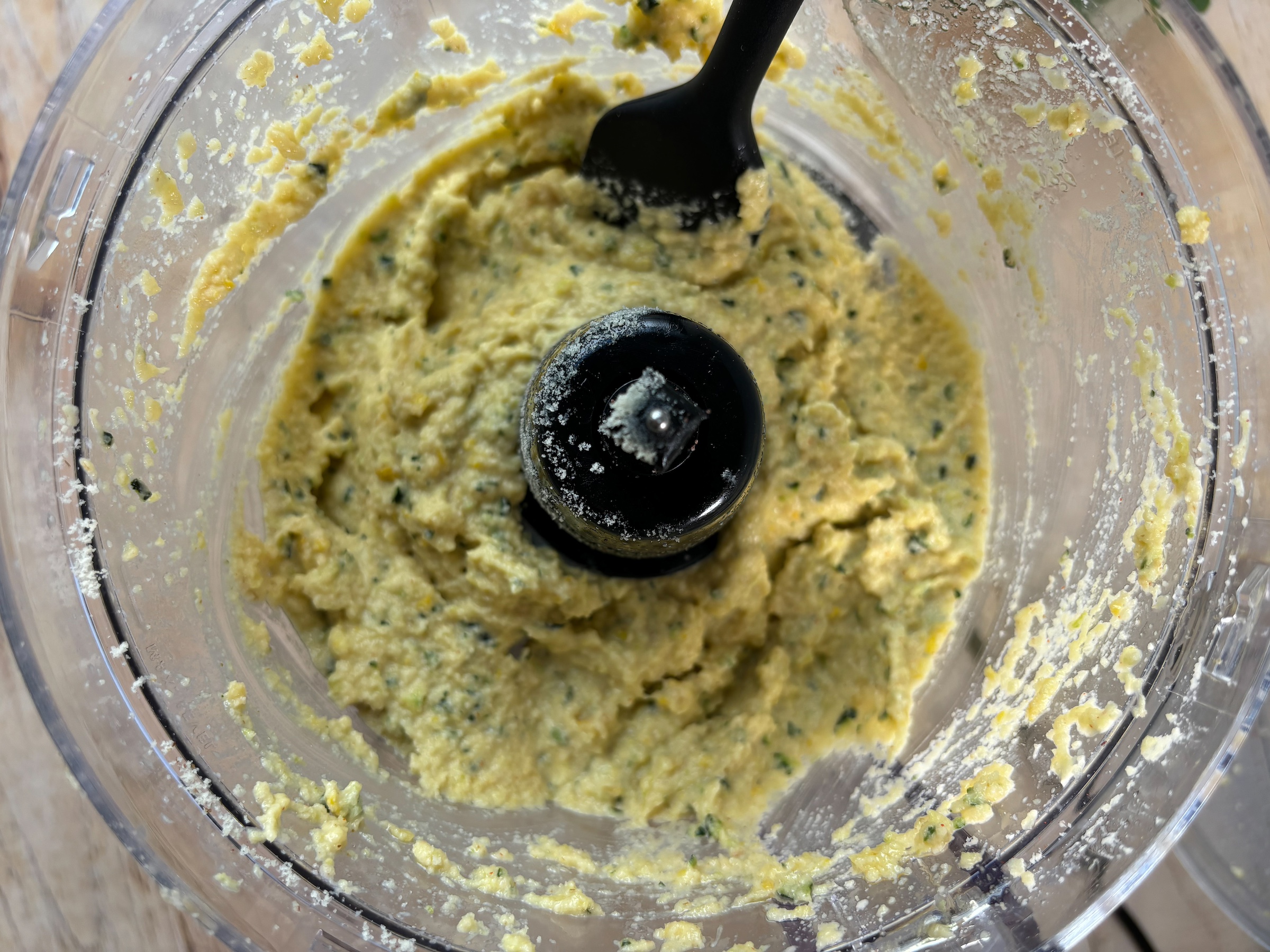 Garden veggie chips being prepped in food processor.