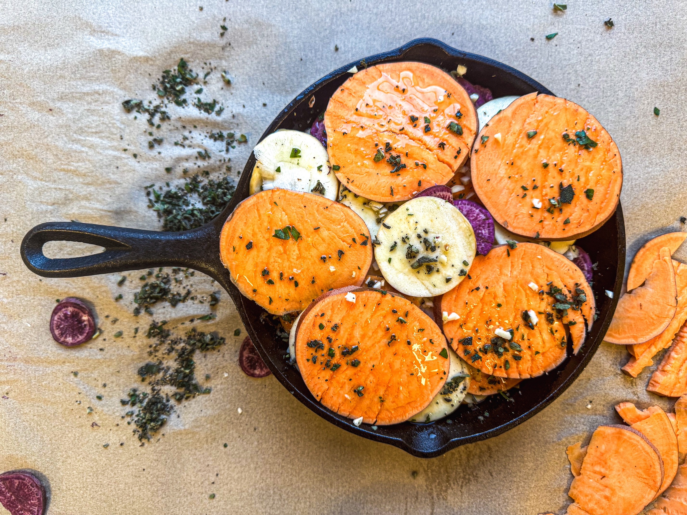 Sweet potato pommes anna in a cast iron. 