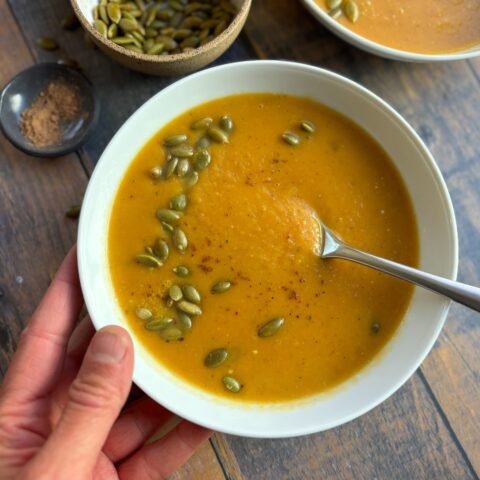 Roasted acorn squash soup in one bowl, finished.