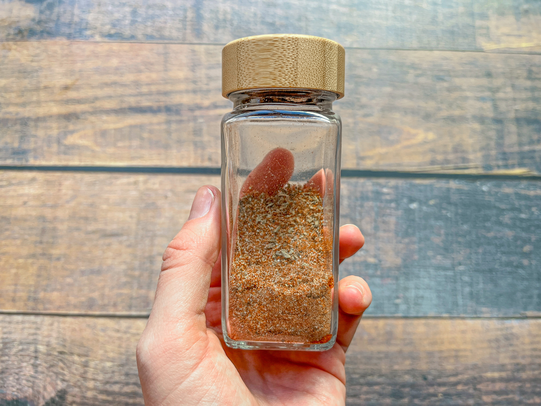 Cajun seasoning in a spice jar. 