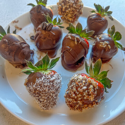 Chocolate-covered strawberries finished on a plate, with all the flavors.