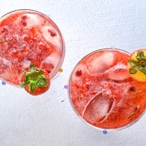 Strawberry sour mocktails overhead shot in martini glasses.