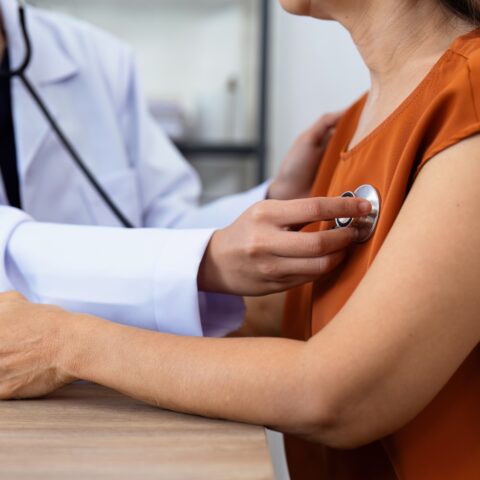 Image of a woman getting her heart checked for cardiovascular health