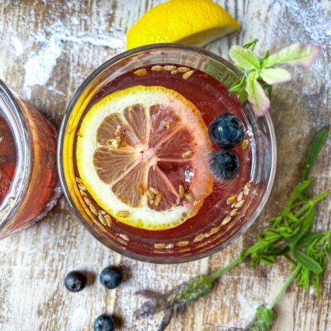 Blueberry-lavender mocktail finished from a Birdseye view.