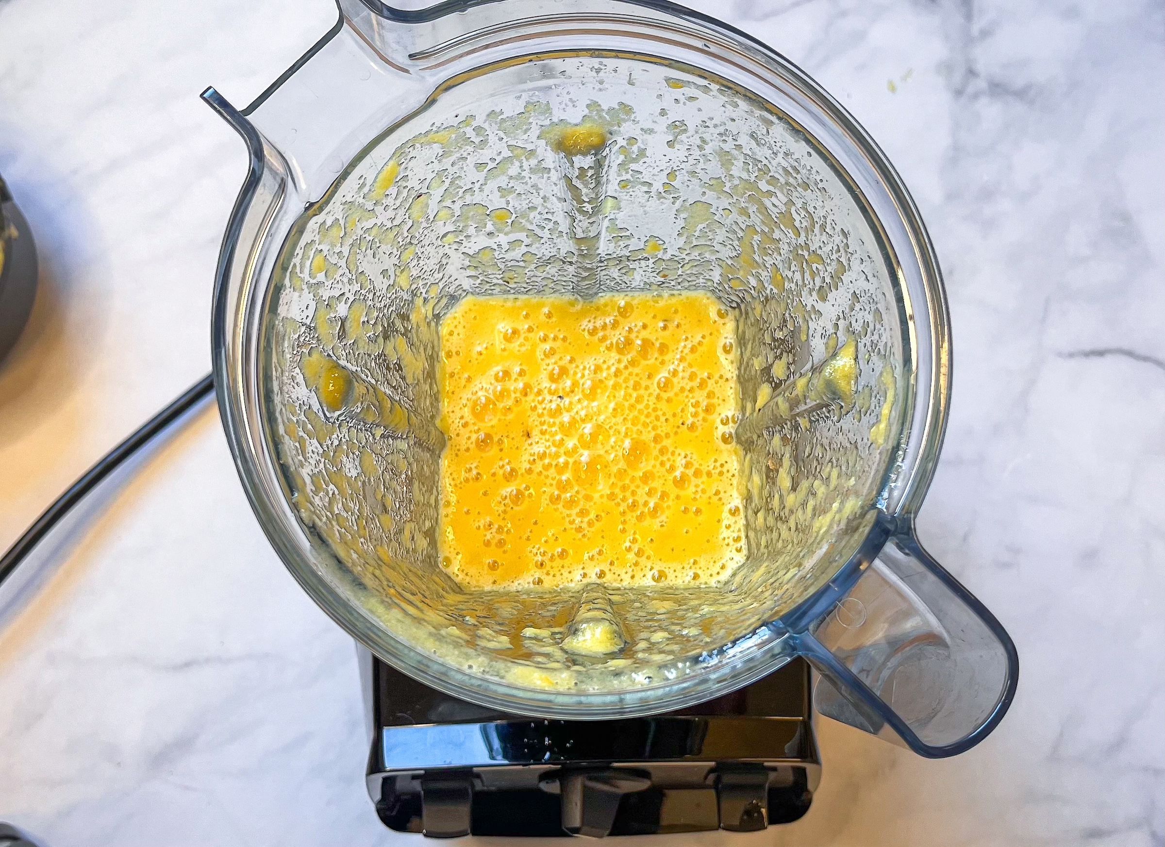 Elderberry citrus elixir in a blender from above. 