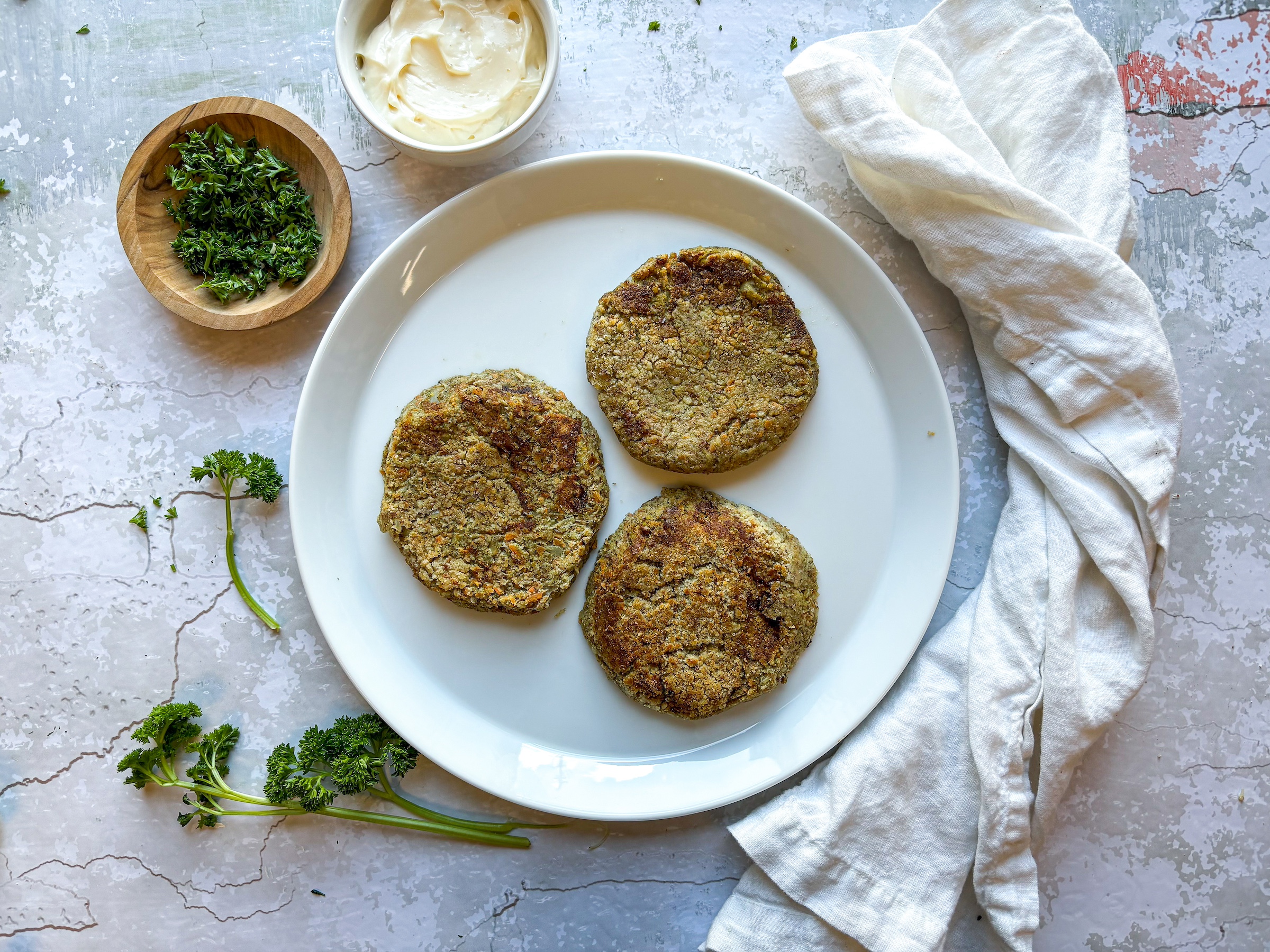 Vegan crab cakes finished on a plate. 