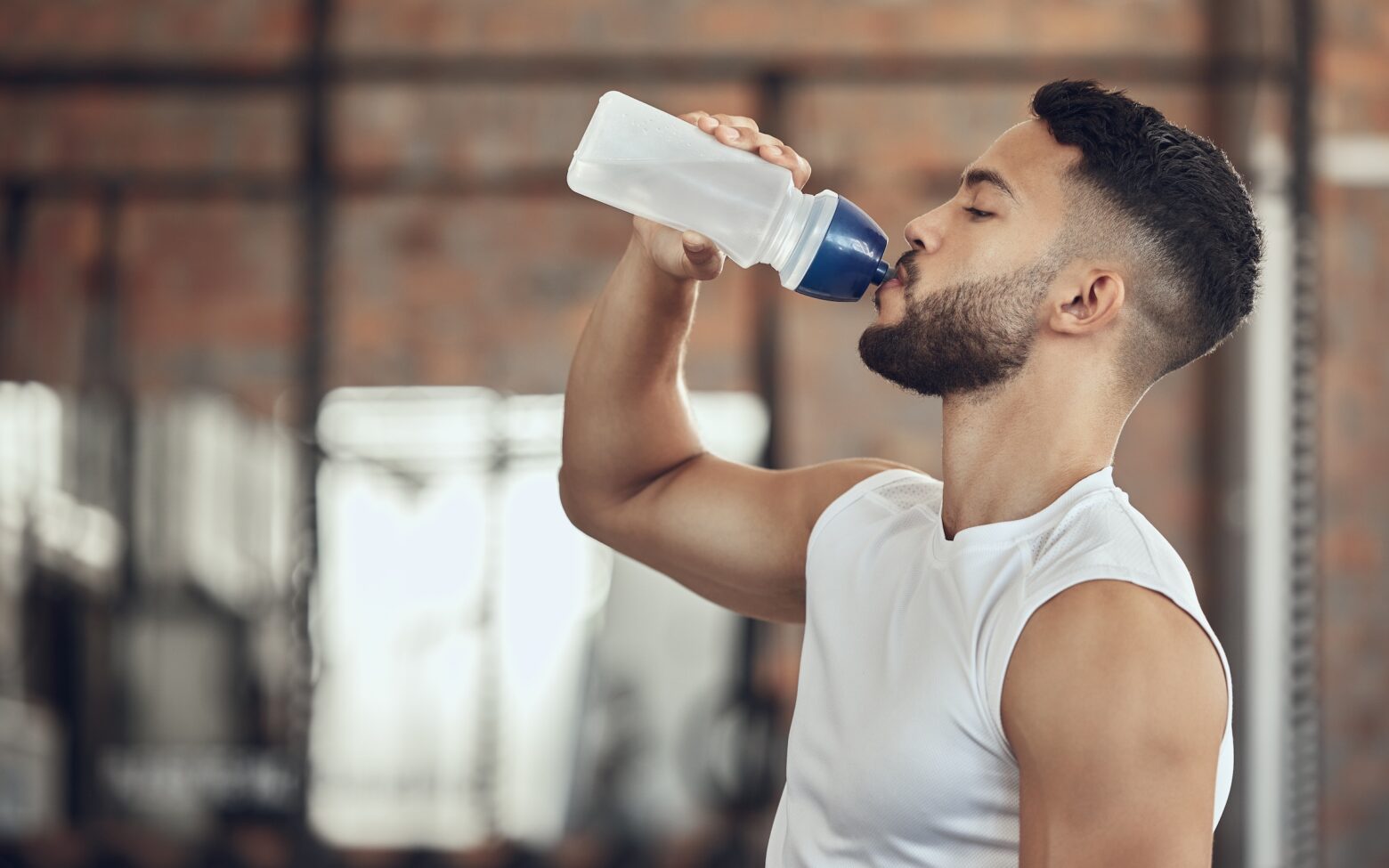 Athlete-Nutrient-Timing-Fueling-with-Water-in-Gym-After-Workout