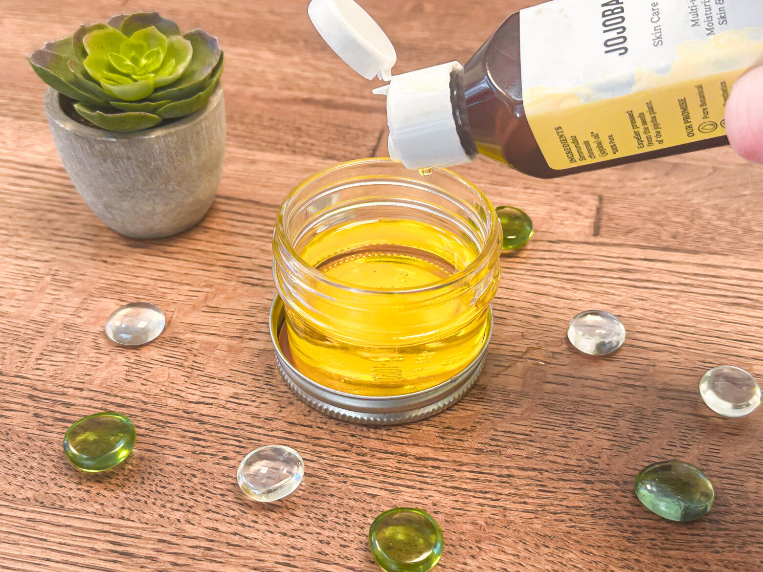 DIY makeup remover prepping the oil.