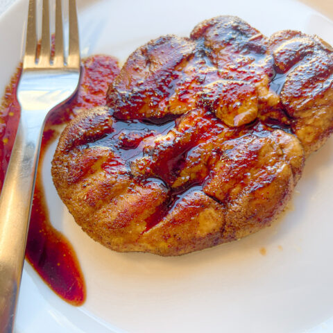 Fully cooked Lion's Mane Steak on a plate