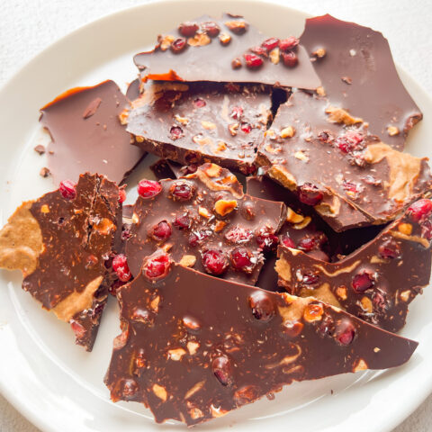 Pomegranate Chocolate Bark on a plate, finished.