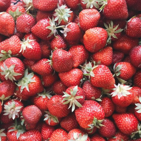 Strawberries in a pile.