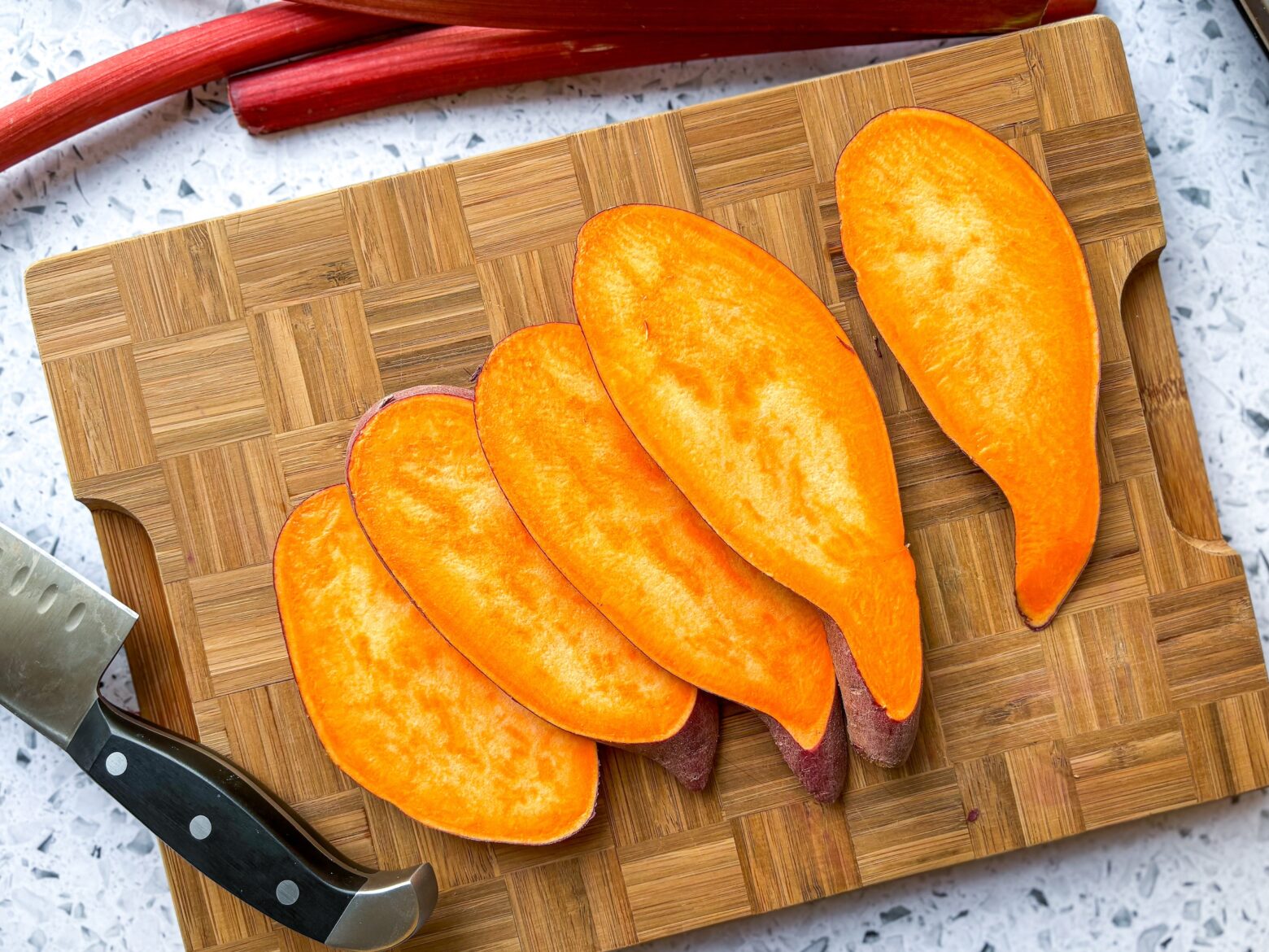 Sweet potato canapés prepping the sweet potatoes.