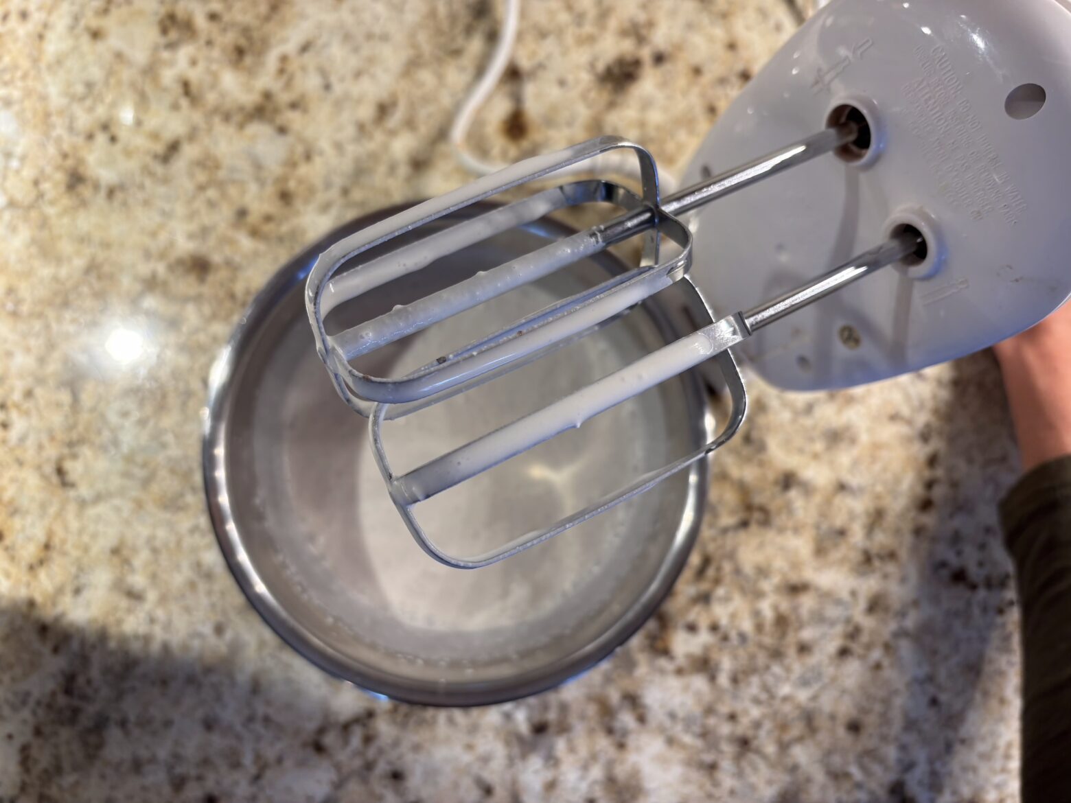 Coconut whipped cream being prepped.