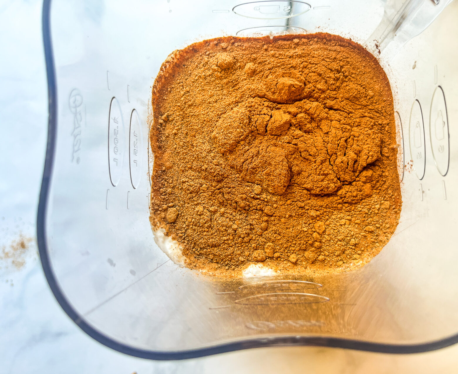 Dairy-free horchata prep overhead in a blender.