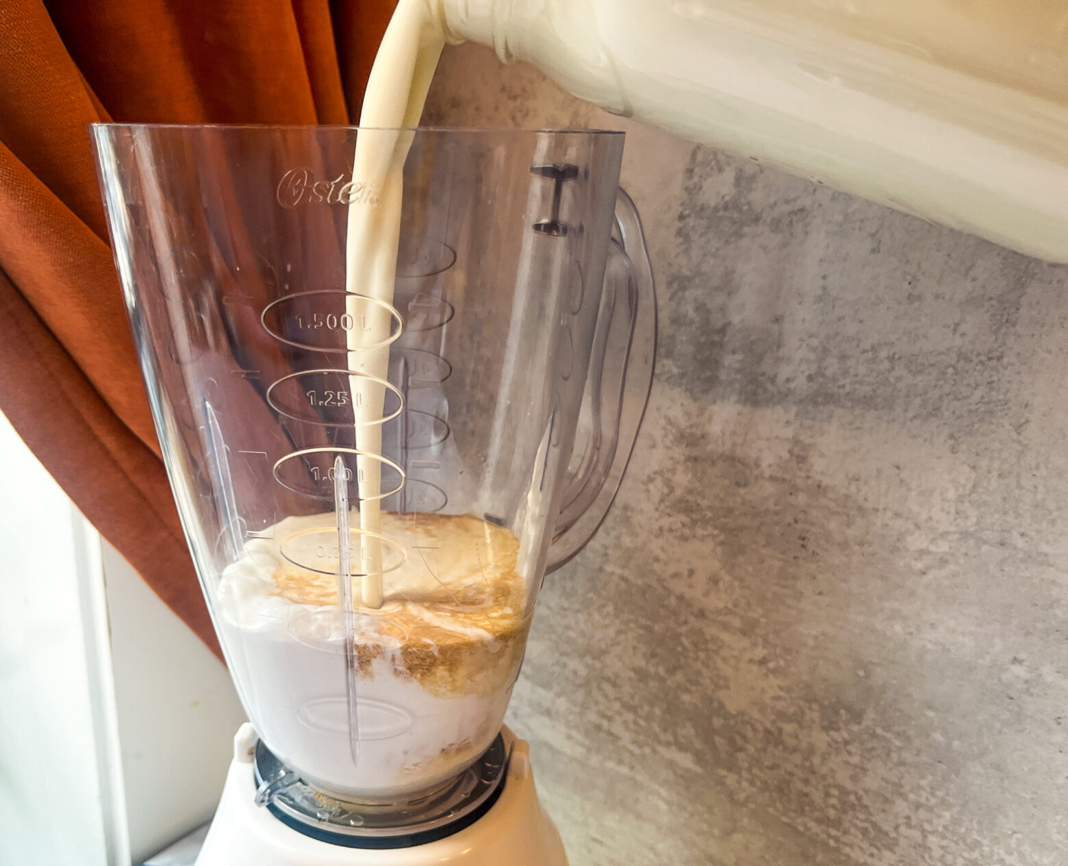 Dairy-free horchata being prepped in a blender.