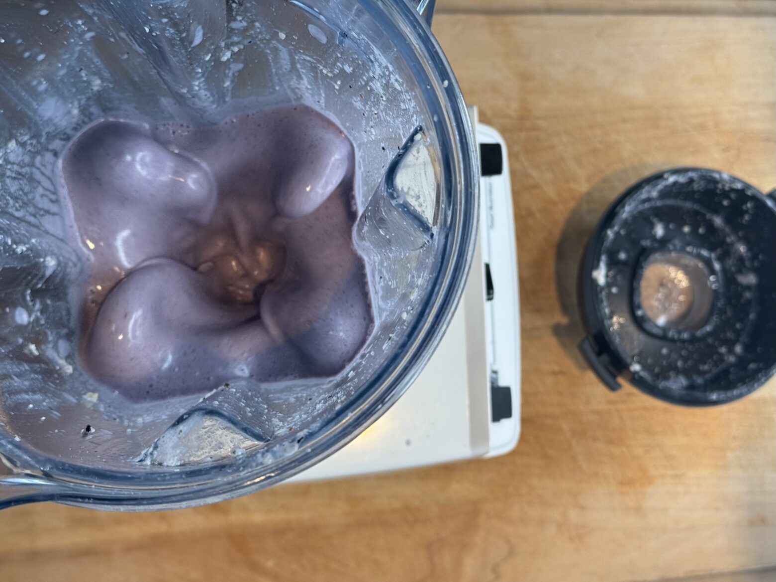 Vegan protein shake in the blender, blending.