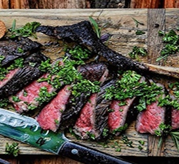 Certified piedmontese tomahawk ribeye steak.