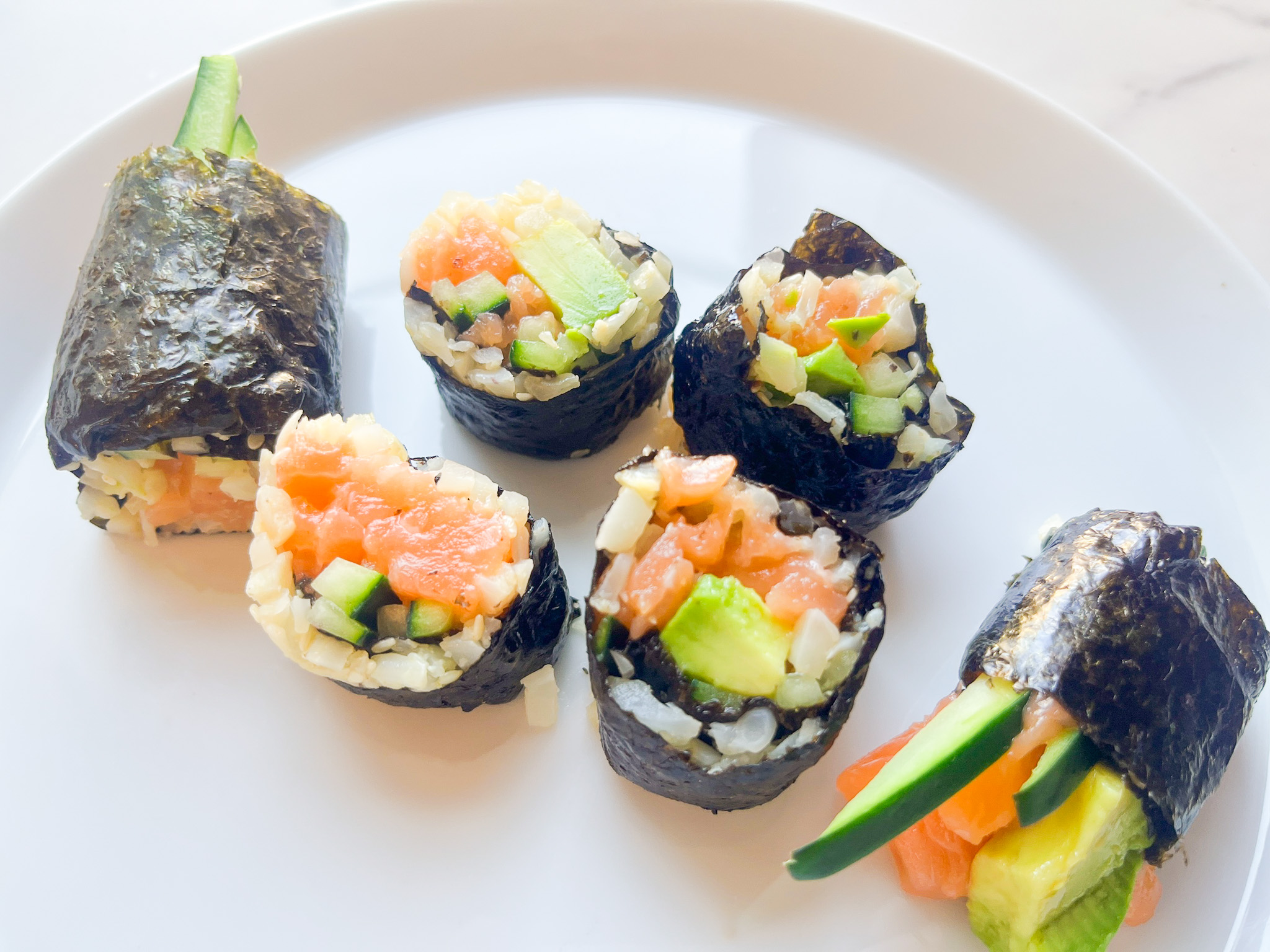 Paleo sushi roll on a plate. 