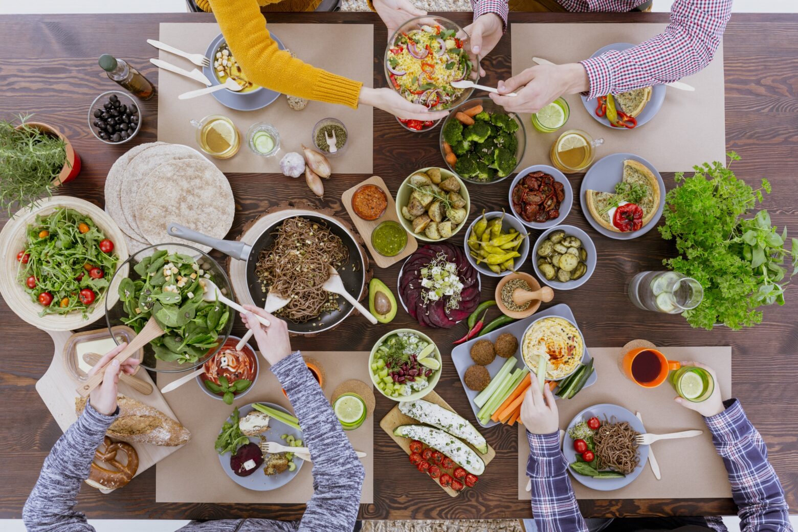 Overhead shot of people eating a healthy dinner