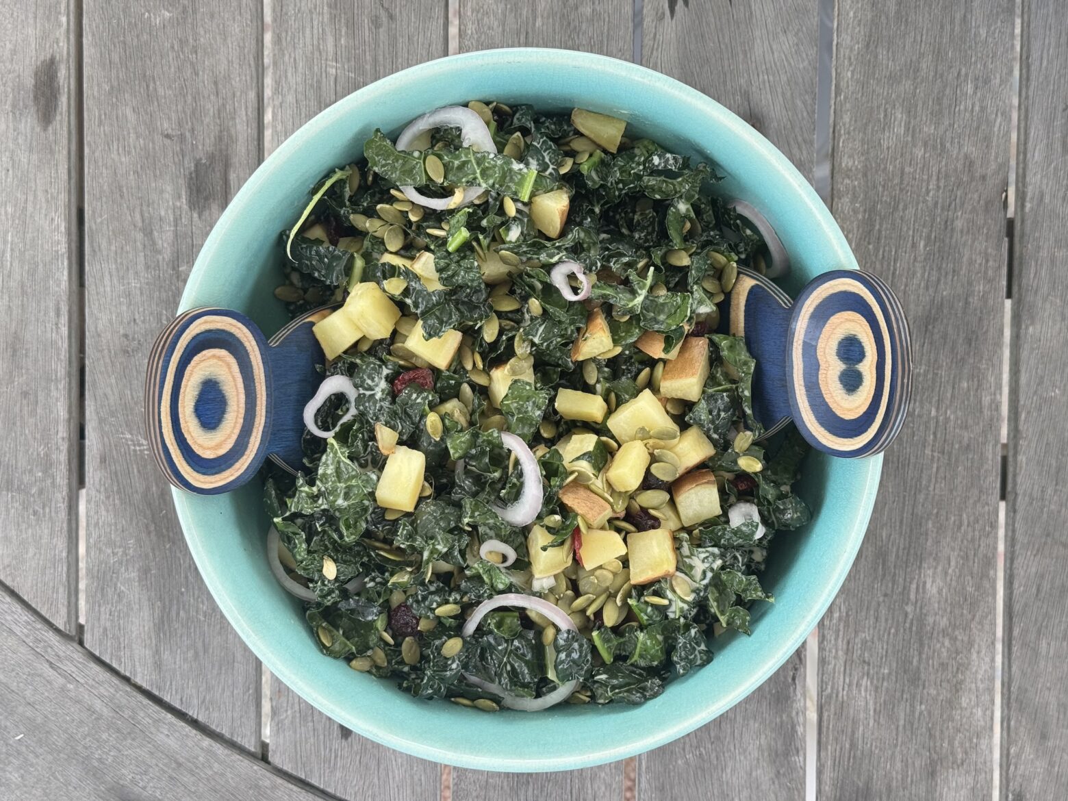 Kale and Sweet Potato salad finished in a bowl.