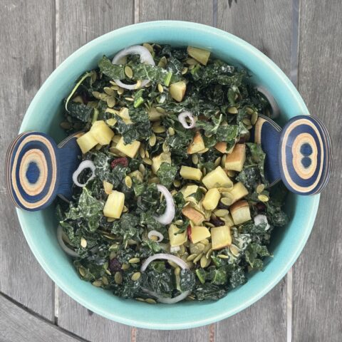 Kale and Sweet Potato salad finished in a bowl.