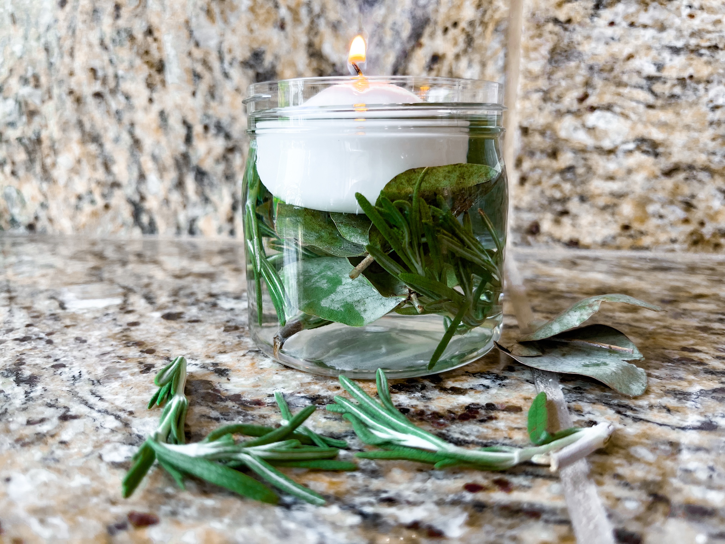 Mosquito repellent candle with a flame. 