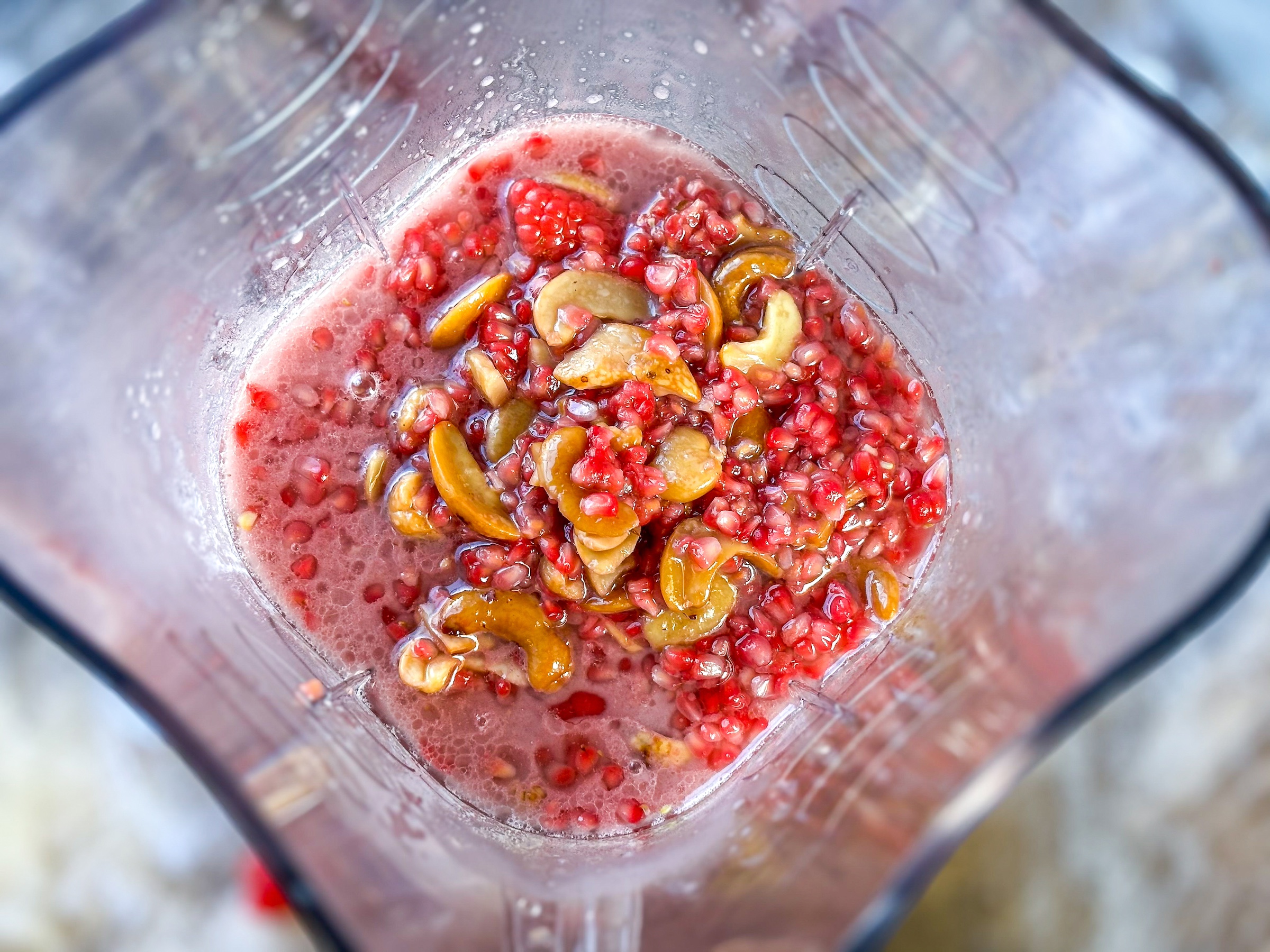 Raspberry mini tart preparation in blender, pre blend. 