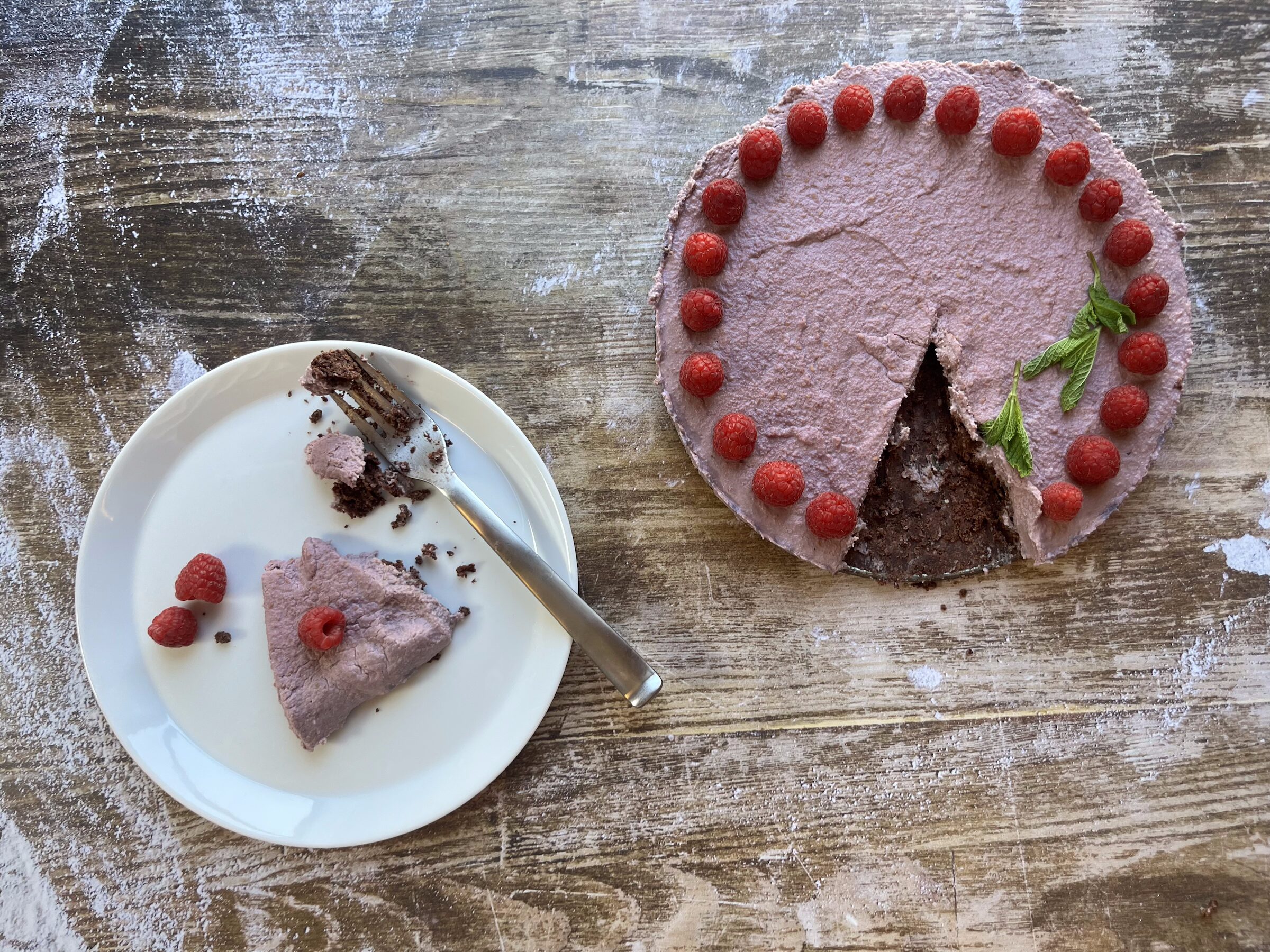 Raspberry mini tart finished and plated . 
