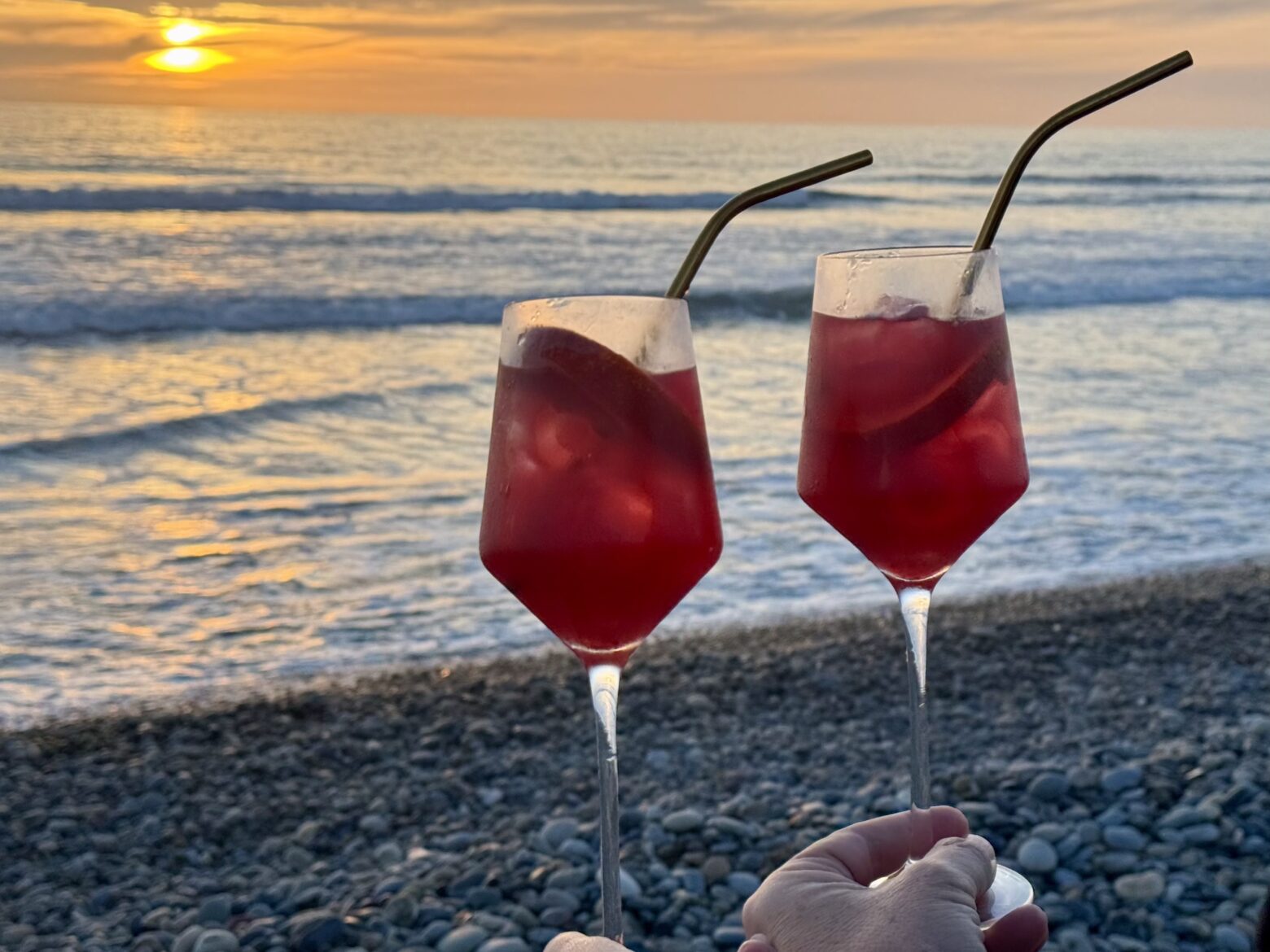 Aperol spritz finished infront of the beach.