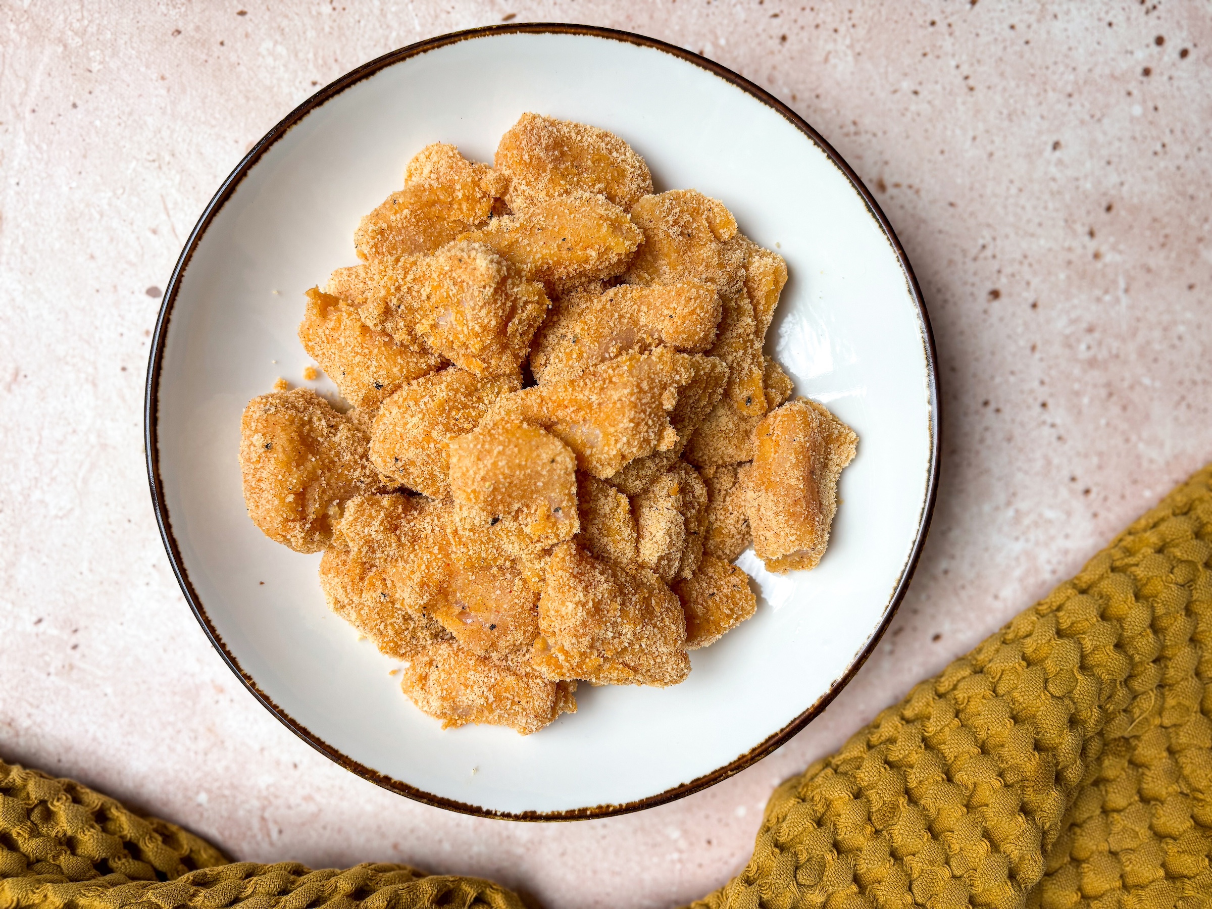 Baked chicken bites in a bowl, finished. 
