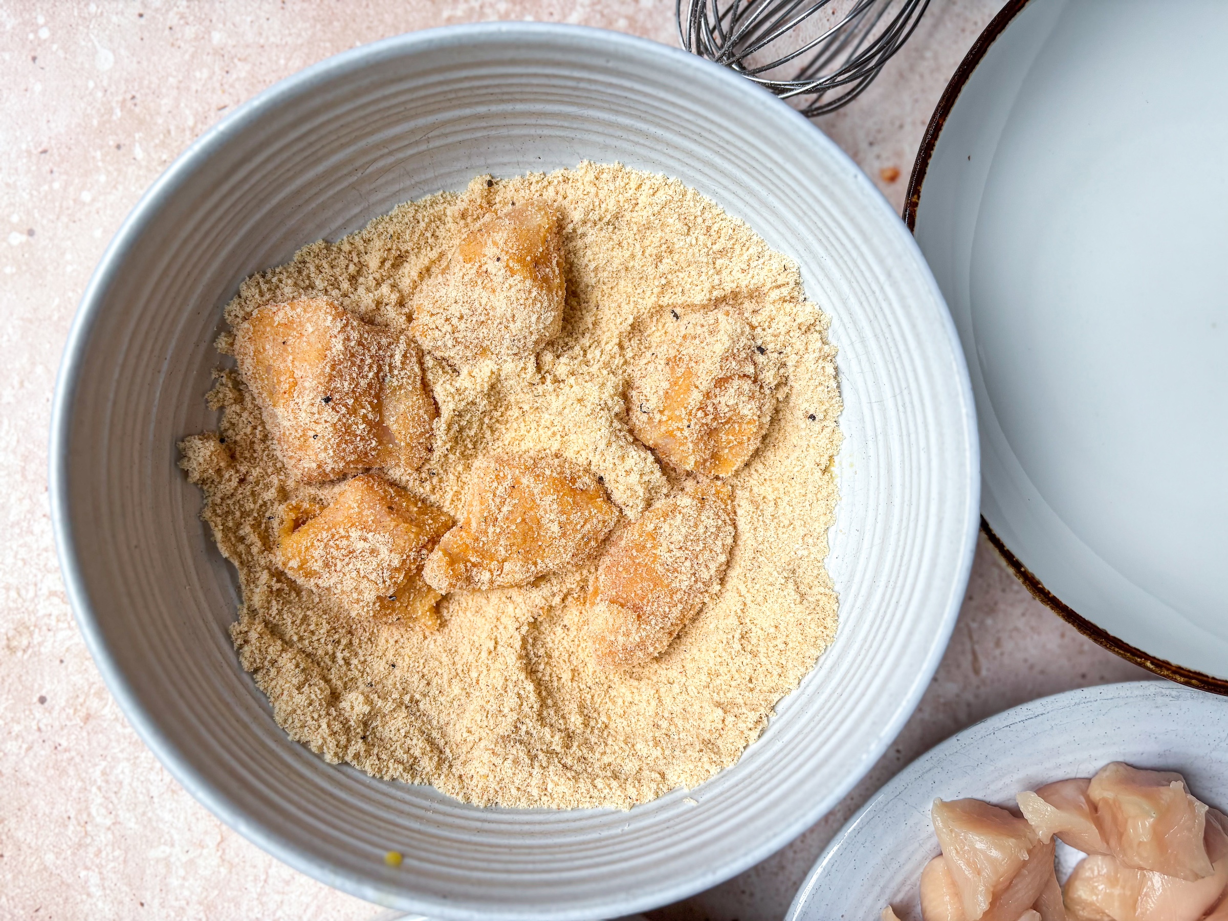 Baked chicken bites being prepped. 