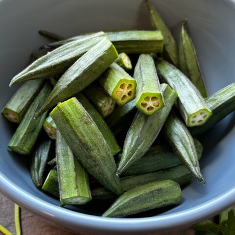 Baked okra bites in a bowl, before they were cooked.